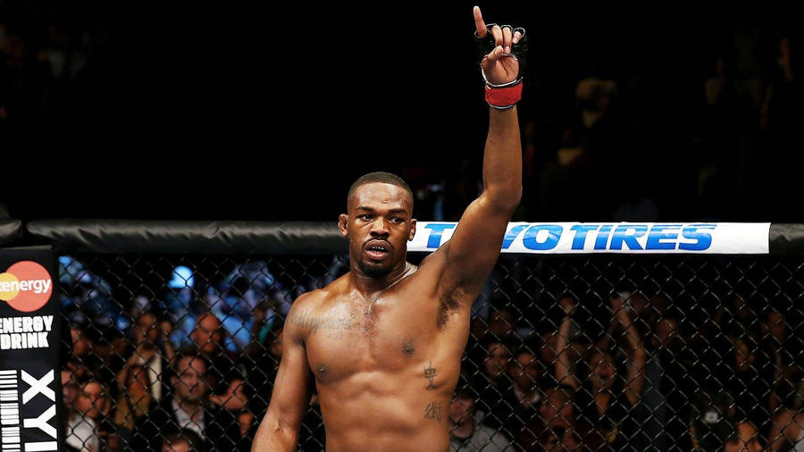 Mma Fighter Jon Jones Raising Finger Wallpaper