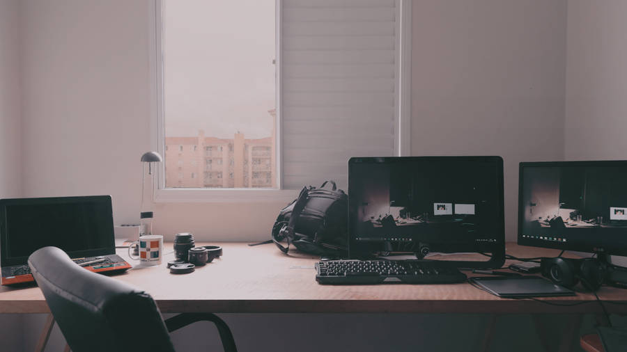 Modern City Office Desk Near Window Wallpaper