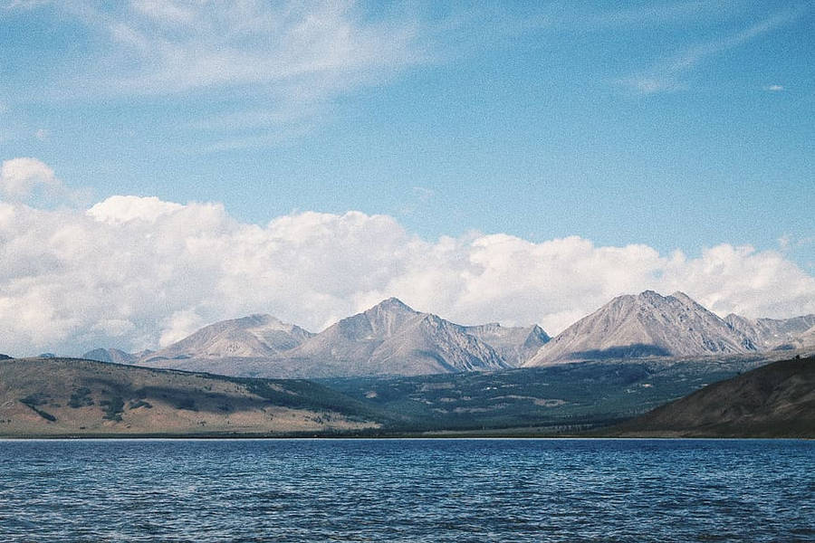 Mongolias Lake Under Clouds Wallpaper