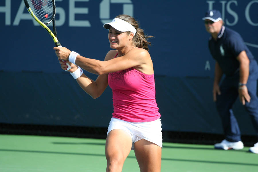 Monica Niculescu Swinging Her Racket Wallpaper