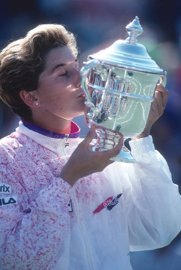 Monica Seles Kissing Her Trophy Wallpaper