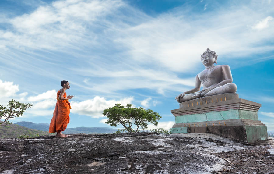 Monk Praying To Buddha Desktop Background Wallpaper