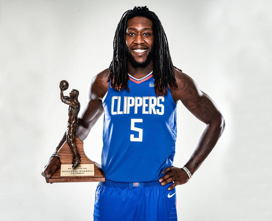 Montrezl Harrell Of Los Angeles Clippers Holding A Trophy Wallpaper