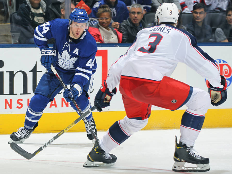 Morgan Rielly In Action For The Columbus Blue Jackets Wallpaper