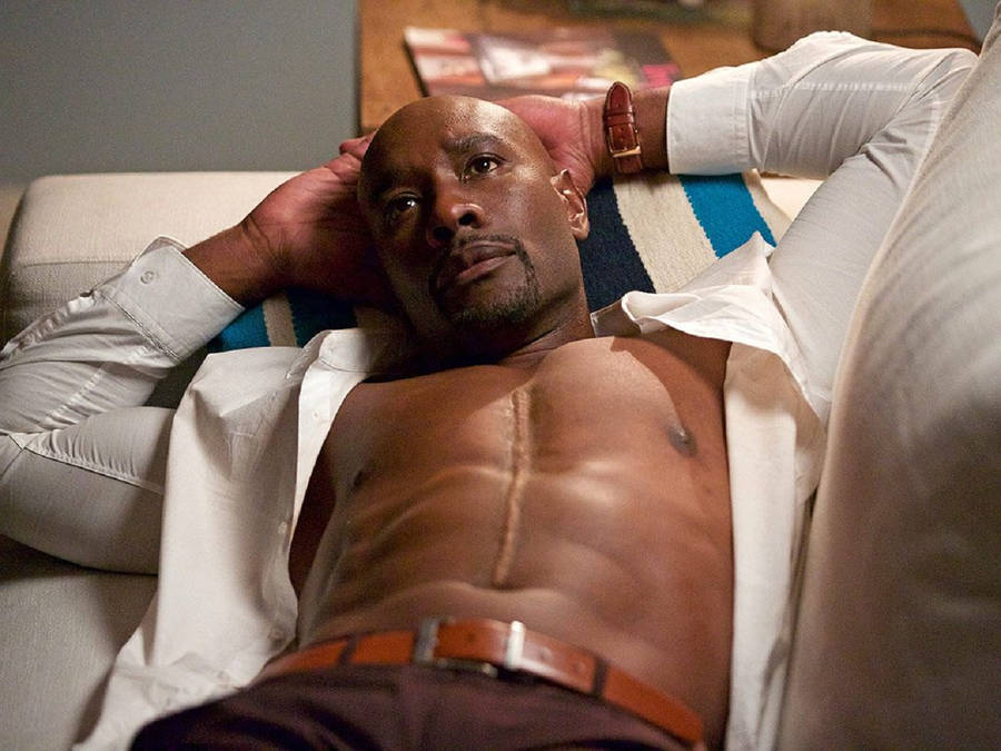 Morris Chestnut In White Couch Wallpaper