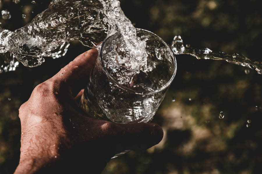 Moving Water In A Glass Wallpaper