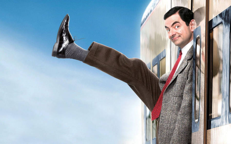 Mr. Bean Holiday Getting Off Train Wallpaper