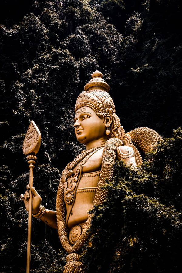 Murugan Statue With Trees Wallpaper