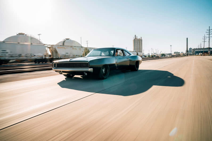 Muscle_ Car_ Speeding_ Beside_ Train_ Tracks.jpg Wallpaper