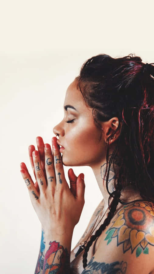 Music Icon Kehlani Performing On Stage Wallpaper