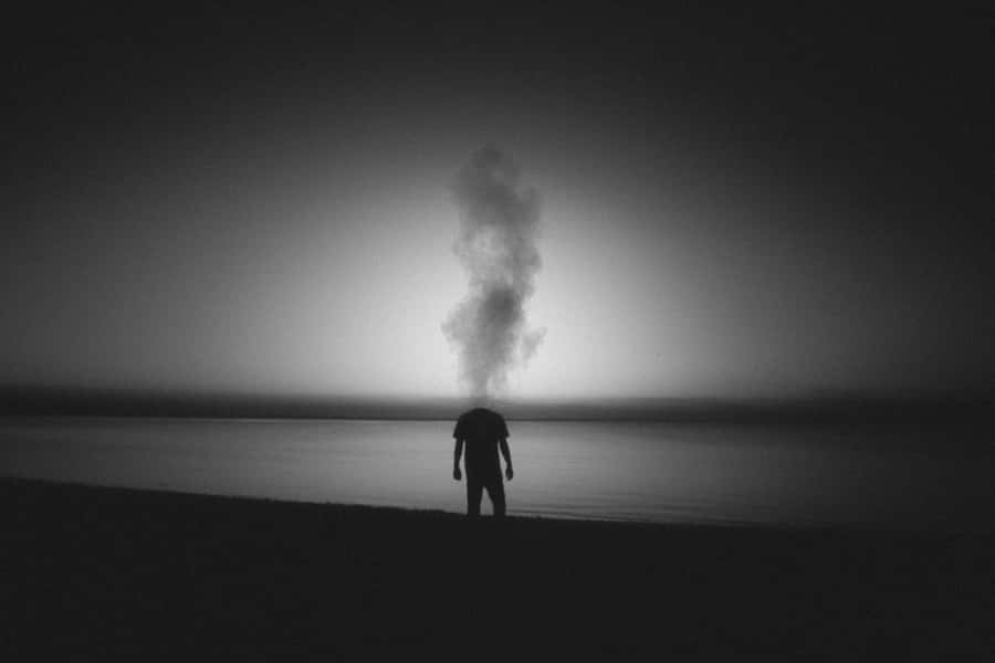 Mysterious Figure Smoke Head Silhouette Wallpaper