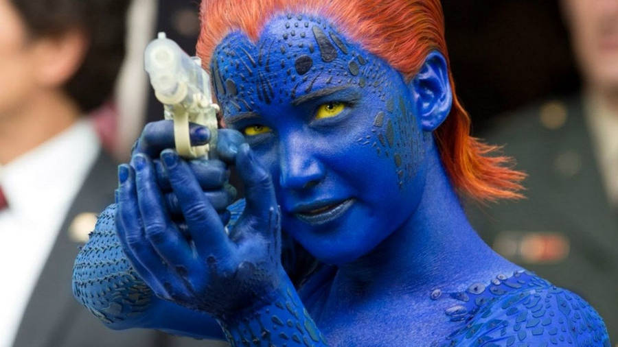 Mystique Pointing With Gun Wallpaper