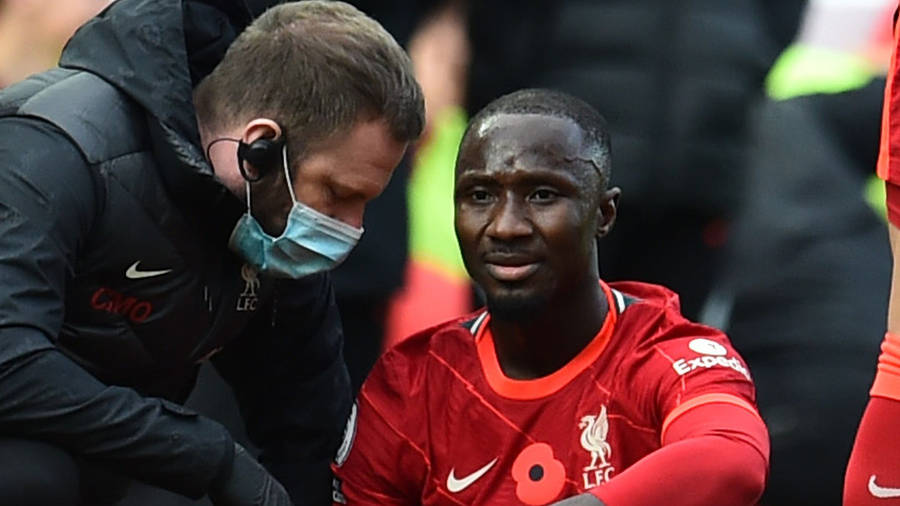 Naby Keita Being Comforted Wallpaper