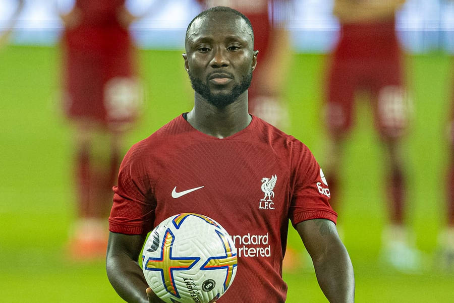 Naby Keita Holding Football Wallpaper