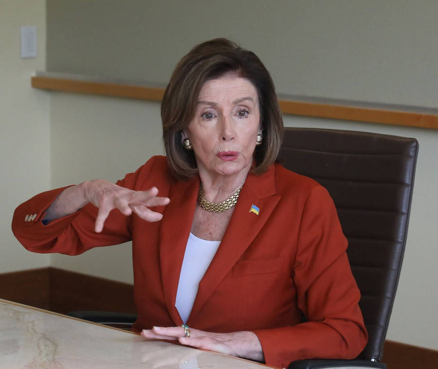 Nancy Pelosi Hand Gesture Wallpaper