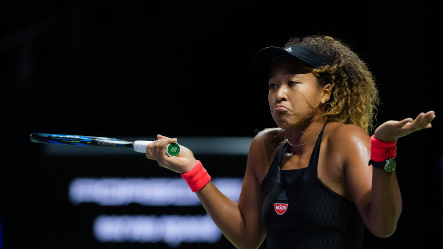 Naomi Osaka Shrugging Shoulders Wallpaper