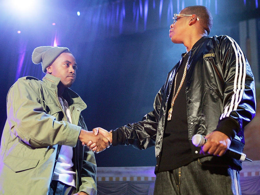 Nas And Jay Z On Stage Together Wallpaper