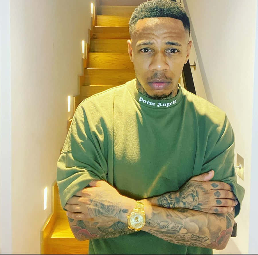 Nathaniel Clyne - Off The Pitch In Casual Green Style Wallpaper