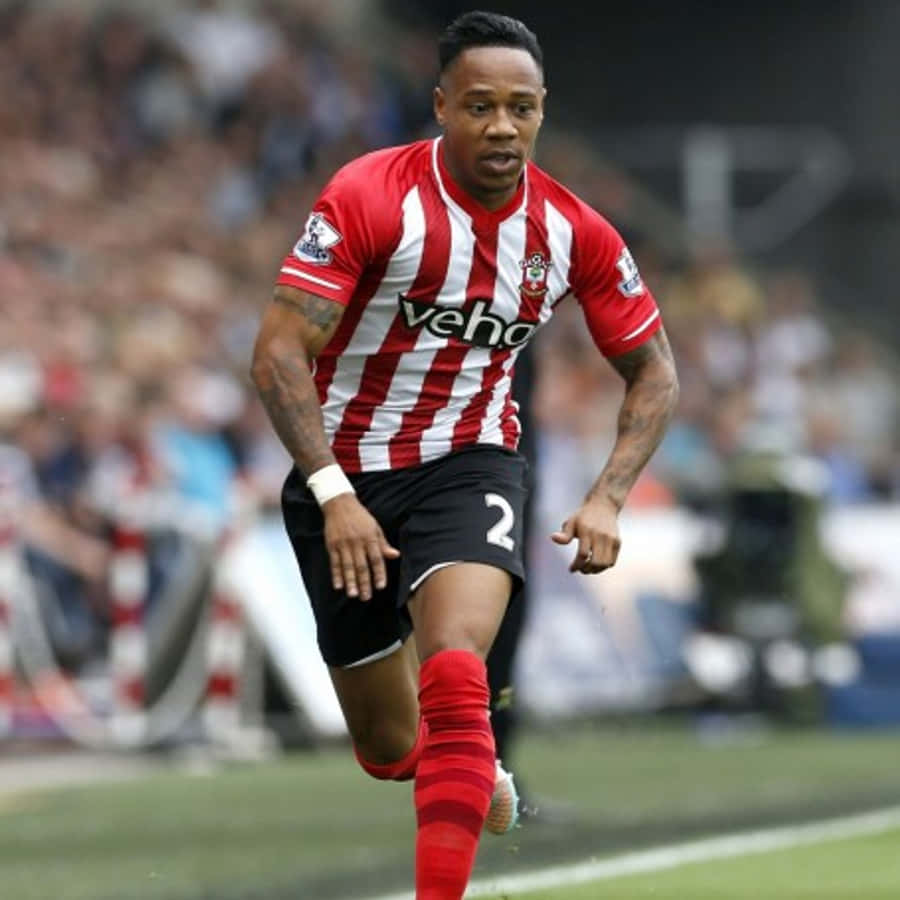 Nathaniel Clyne Running Front View Wallpaper