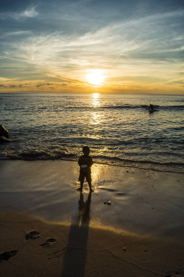 Nauru Child By The Beach Wallpaper