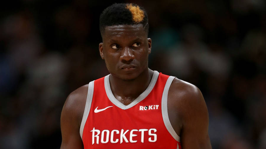 Nba Star Clint Capela Engaged In An Intense Game Wallpaper