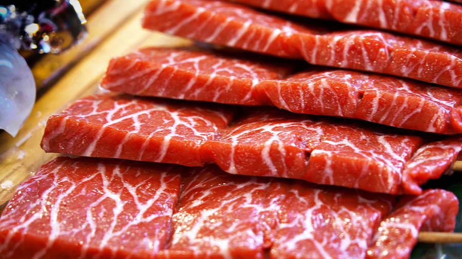 Neatly Arranged Sliced Kobe Beefs Wallpaper