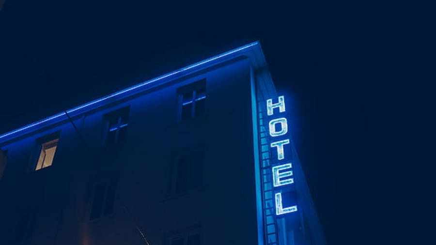 Neon Blue Hotel Signage Wallpaper