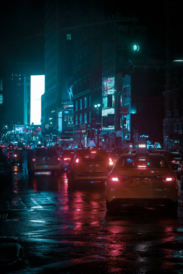 Neon Cars On Busy Street Wallpaper