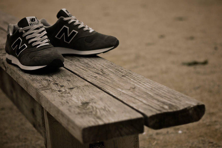 New Balance On Wooden Long Chair Wallpaper