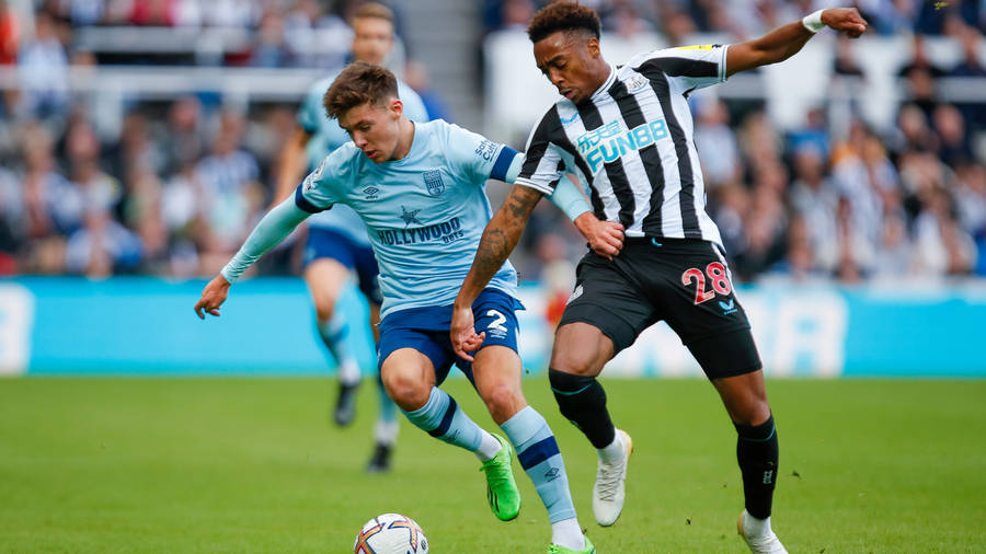 Newcastle United Fc Player Stealing Football Wallpaper