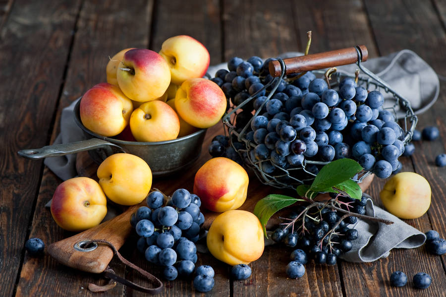 Newly Harvest Nectarine And Apricot Grapes Wallpaper