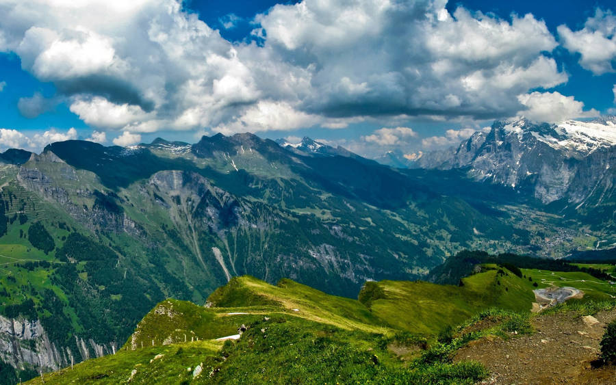 Nice High Mountains And Clouds Wallpaper