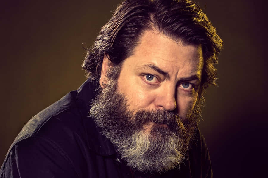 Nick Offerman Enjoying A Cup Of Coffee Wallpaper