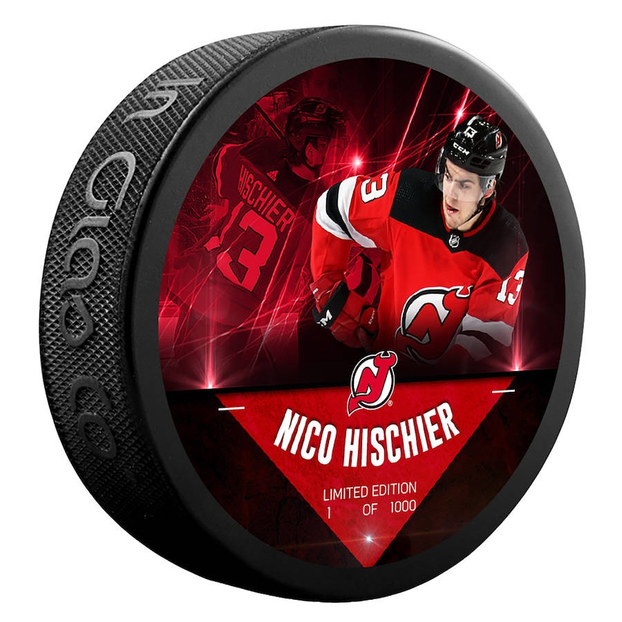 Nico Hischier In Action On The Ice. Wallpaper