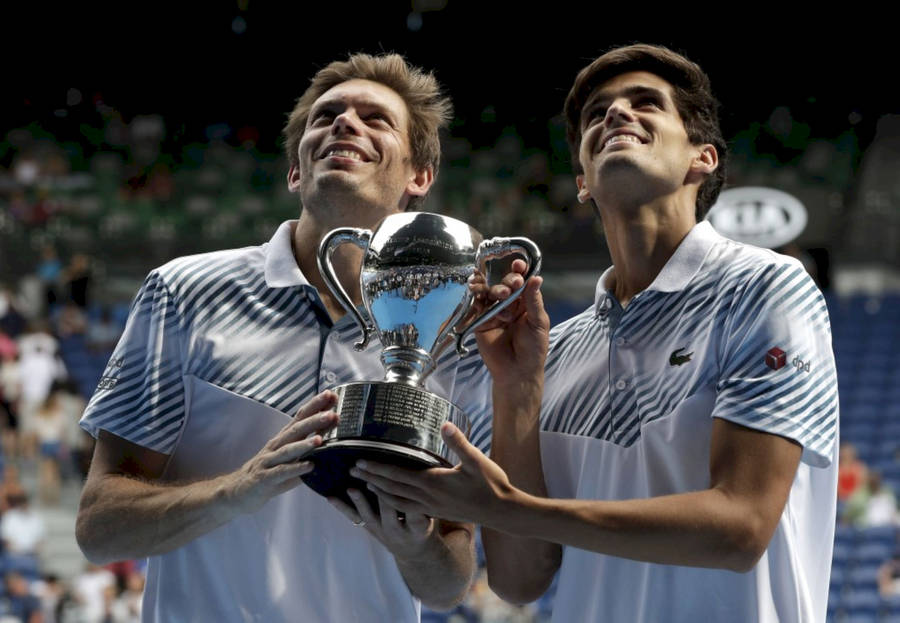 Nicolas Mahut And Partner Looking Up Wallpaper