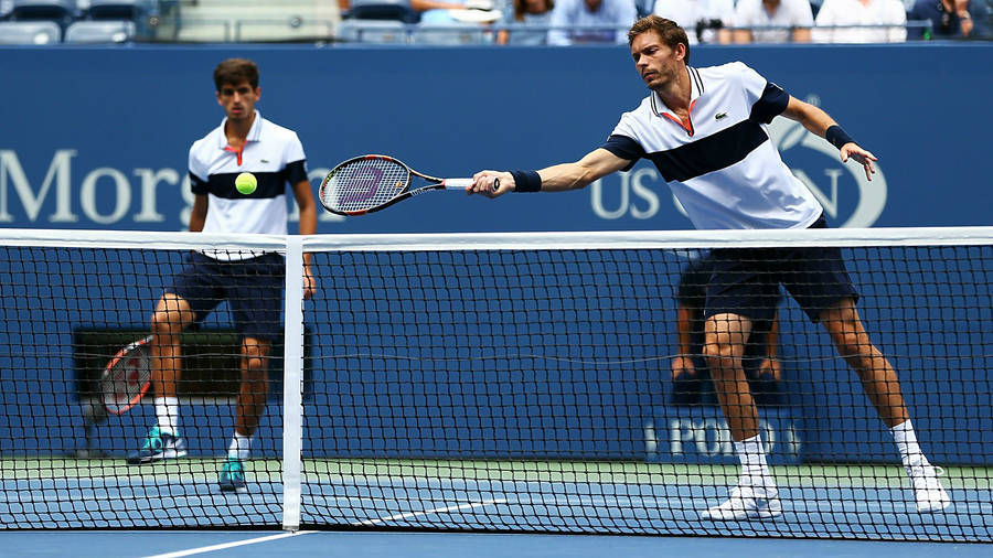 Nicolas Mahut Graceful Forehand Stroke Wallpaper