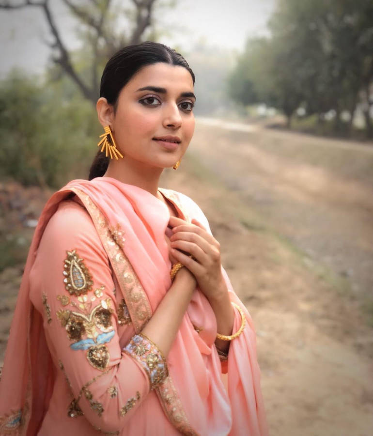 Nimrat Khaira Hands Over Heart Wallpaper