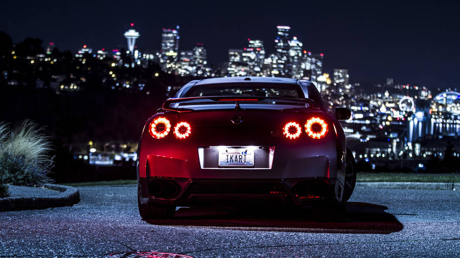 Nissan Gtr Car Heading To The City Wallpaper