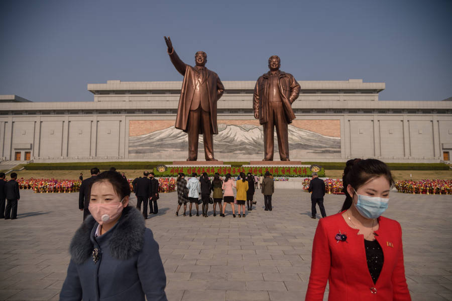 North Korea Citizens Wearing Masks Wallpaper