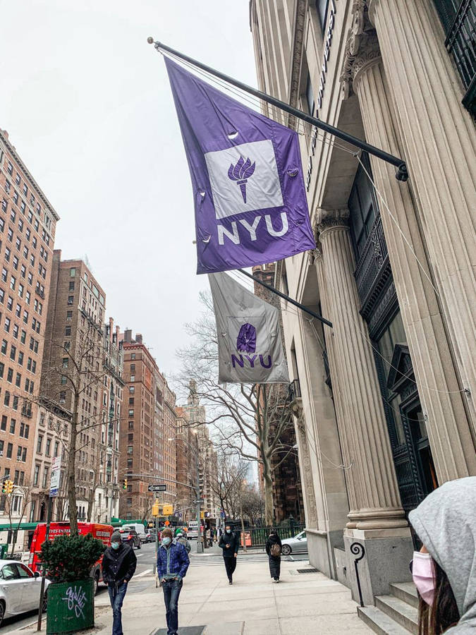 Nyu Students Walking Across Campus Wallpaper