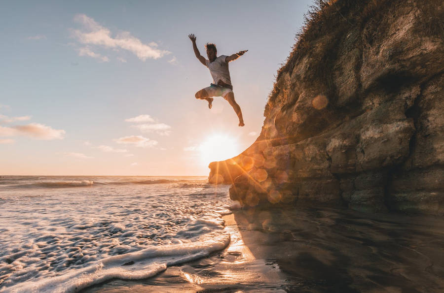 Ocean Shore Jumping Wallpaper