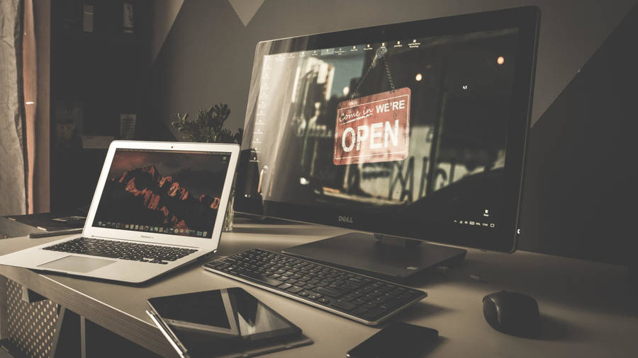 Office Desk With White Laptop Wallpaper