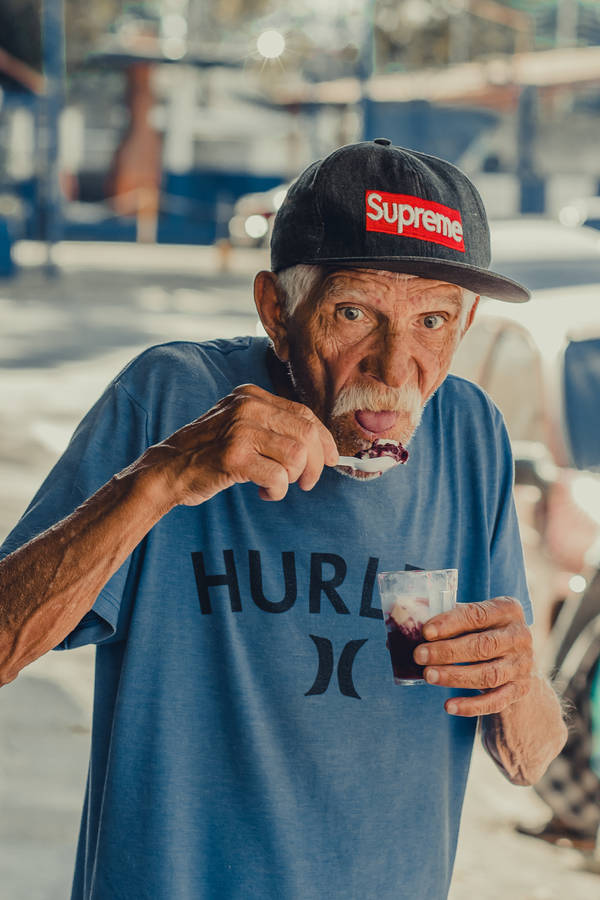 Old Man Eating Ice Cream Wallpaper