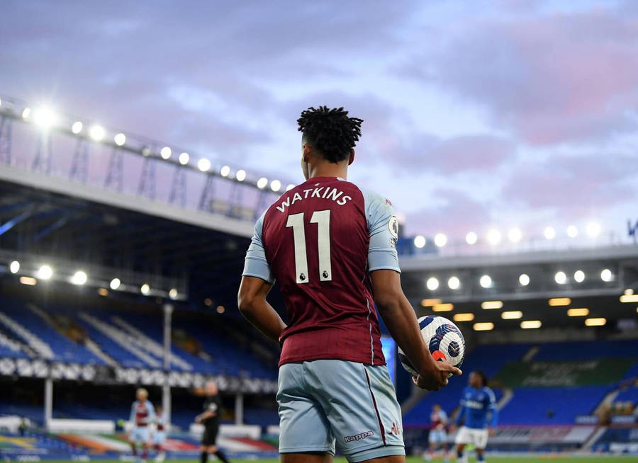 Ollie Watkins Sporting The Number 11 Jersey In An Adrenaline-filled Match. Wallpaper