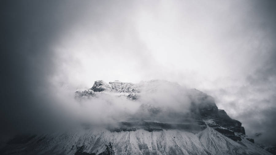 Ominous And Foggy Elevated Landscape Wallpaper