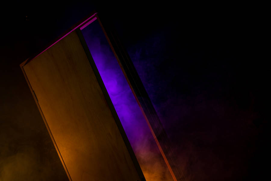 Open Door With Light Purple Glow Wallpaper