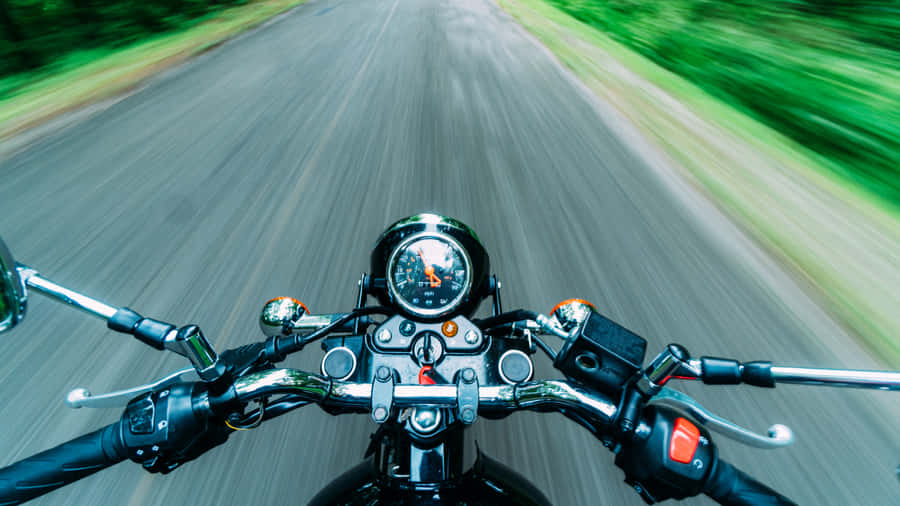 Open Road Adventure Under The Blue Sky Wallpaper