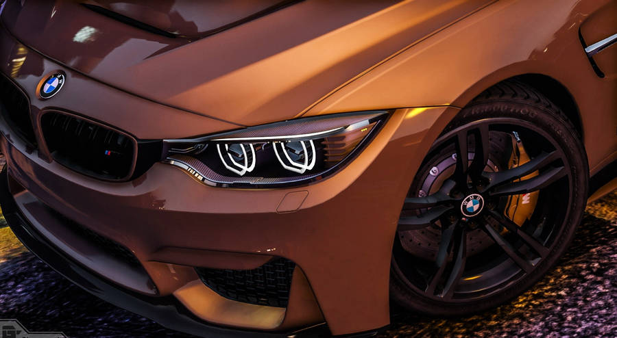 Orange Hood Bmw Displayed On Laptop Wallpaper