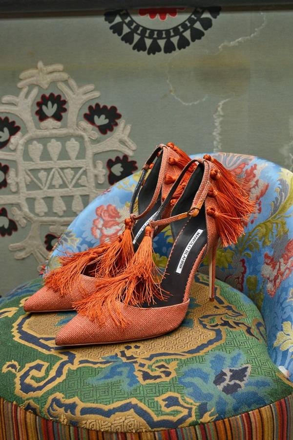 Orange Manolo Blahnik Heels With Tassels Wallpaper