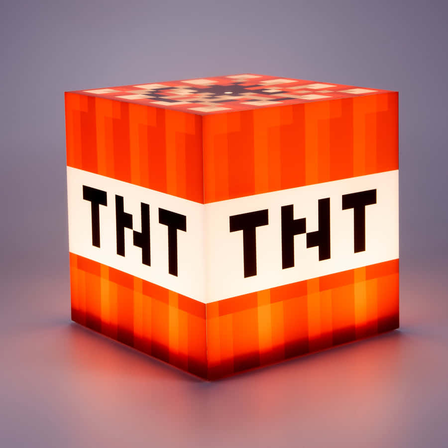 Orange Minecraft Tnt On Shiny Surface Wallpaper